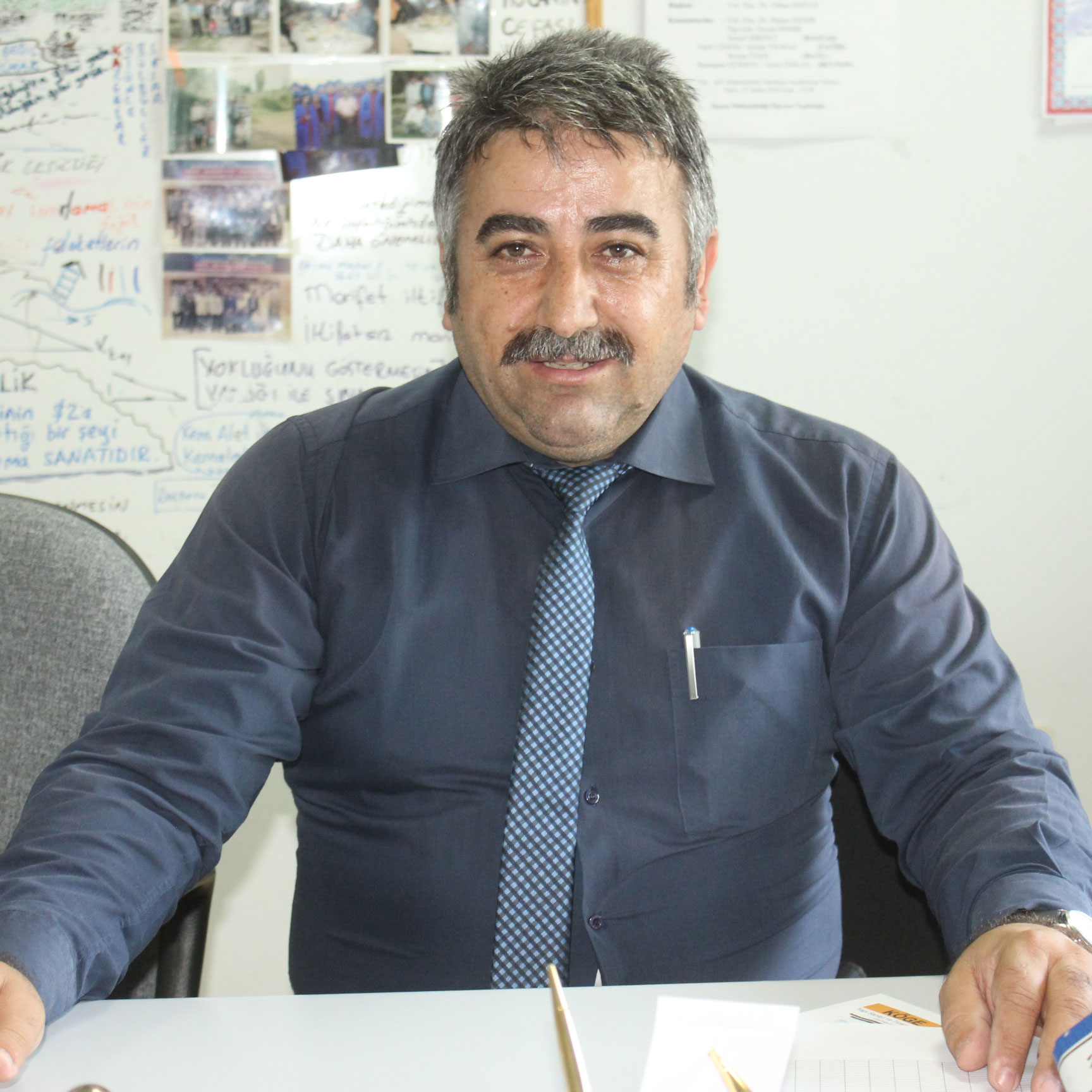 ORHAN  DOĞAN